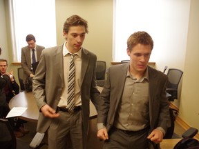 Ontario Hockey League players Nick Cousins (right) and Mark Petaccio leave after speaking with reporters in Sault Ste. Marie, Ont. on Thursday, April 3, 2013. The Crown withdrew sexual assault charges against Cousins, Petaccio and Andrew Fritsch (pictured seated left). The three men were placed on a 12-month peace bond.
MICHAEL PURVIS/SAULT STAR/QMI AGENCY