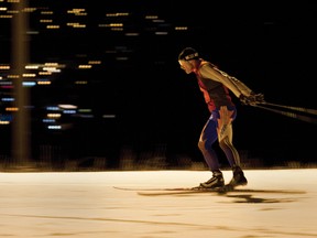 A competitor skis by lamplight during the 2013 Canmore SkiFest on Saturday night, March 30, 2013. Leighton Poidevin won the 24-hour event, finishing 117 laps of the three-kilometre course. Justin Parsons/  Canmore Leader