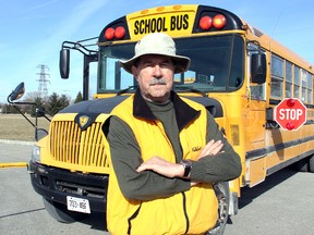School bus driver Keith Groen, of Chatham, Ontario is worried what could happen if motorists continue to  ignore his warning lights and sign while children use his bus. (VICKI GOUGH, Chatham Daily News)