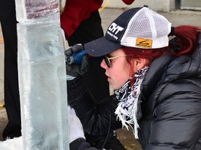 Canadore College culinary student Megan Levesque adds detail Thursday to an ice carving that will be used for an upcoming buffet.
(Steven Newman photo)