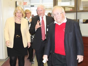 Health Minister Deb Matthews walks through Seaforth Community Hospital with Huron Perth Healthcare Alliance CEO Andrew Williams and board chair Dick Burgess before making a funding announcement of $5 million for small, rural hospitals throughout the South West LHIN.