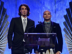 NFL athletes Chris Kluwe and Brendon Ayanbadejo speak onstage at the 24th Annual GLAAD Media Awards. (AFP)