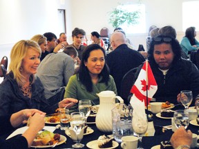 Portage-Lisgar MP Candice Bergen, left, hosted a dinner to welcome immigrants to the region on April 2 at the Carman Active Living Centre.
