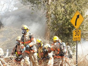 Norfolk firefighters responded to a blaze at an old home on Commercial Road in Port Ryerse Friday afternoon. No injuries were reported. Damage to the structure is extensive. (MONTE SONNENBERG Simcoe Reformer)