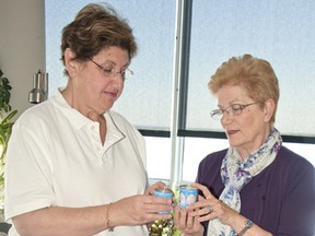 The Kingston Jewish Council is hosting an event Sunday for Yom Hashoah (Holocaust Remembrance day.) From left, Evelyn Maizen, the advisor for the KJC and Gloria Pivnick, one of the organizers for the program hold the candles that will be lit in remembrance on the day of memorial.
Laura Boudreau for the Whig-Standard