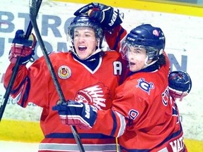 Stratford Cullitons Ryan Watson, right, and defenceman Jordan Currie celebrate a goal in a GOJHL game at the Allman Arena on Family Day in February attended by close to 1,700 fans. Stratford beat Guelph 8-3. (Beacon Herald file photo)