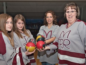 Sporting Millard, Rouse and Rosebrugh team jerseys, (from left) Brooklyn Olinyk, Brooke Roach, Lisa Olinyk and Wendy Andrews get set to take part in the annual Bowl for Kids Sake on Sunday at Echo Bowl in Brantford. The event is the primary fundraiser for the Big Brothers Big Sisters of Grand Erie mentoring programs. (BRIAN THOMPSON The Expositor)