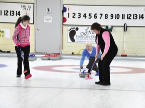 RYAN PAULSEN ryan.paulsen@sunmedia.ca Barclay Childerhose releases a rock while teammates Ashley Luloff, left, and Diane Hokum stand ready to spring into action during the Pembroke Curling Club's year-end 'Closing Spiel' on Saturday, April 6. For more community photos please visit our website photo gallery at www.thedailyobserver.ca.
