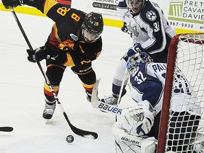 Belleville Bulls forward Carter Sandlak is thwarted by Sudbury Wolves netminder Franky Palazzese during OHL playoff action last season at Yardmen Arena. (Jason Miller/The Intelligencer)