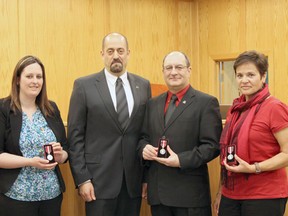 Mayor Moe Hamdon presented Diamond Jubilee Medals to Bio-Mile Co-ordinator Kristina Vallee, Coun. Dean Shular and Director of Community Services Annette Driessen at the Apr. 3 council meeting.