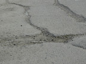 The potholes along 50 Street have been particularly challenging for public works to keep filled.