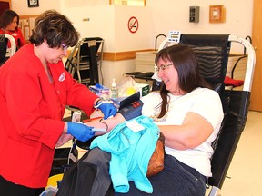 Christina Yankey, Canadian Blood Services worker, watches over Shelley Slobodian’s blood donation at the mobile clinic that was set up at the Whitecourt Seniors Circle on Wednesday, April 3. The goal for the clinic was 120 donations and Whitecourt beat the target with 132 units donated.
Johnna Ruocco | Whitecourt Star