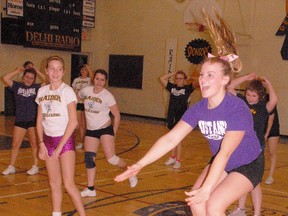 DANIEL R. PEARCE Simcoe Reformer
Taylor Leitch of Delhi District Secondary School practices with her school’s cheer team on Monday night. The squad would like to make it to the nationals this year.