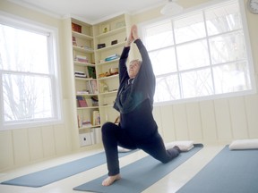 Tricia Maynard demonstrates a yoga pose at the recently opened Satya Yoga Centre in Quinte West.

Emily Mountney Trentonian