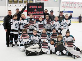 Contributed Photo
The Simcoe Travelodge atom AE Warriors claimed the Southern Counties atom AE championship on Sunday. Pictured are, front row: Jacob Goble, Nathan Gibbons and Johnson Ferras. Second row: Jack Gill, Brett Moore, Nolan Hannah and Leo Estrela. Third row: Keegan Damota, Tyler Eikelboom, Calum Cartmill, Brayden Murphy, Callum Reid, Emily Patrick and Steven Fennel. Back row:  Jeff Goble, Val Damota, Brian Gill, John Moore and Mike Patrick.