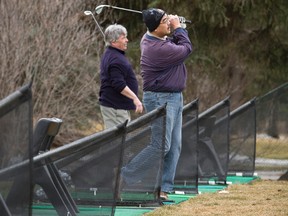 Eager Canmore golfers took to the Canmore Golf & Curling Club’s driving range for the first time this year on Thursday. The course is aiming for an April 26 opening this year. Justin Parsons/ Canmore Leader