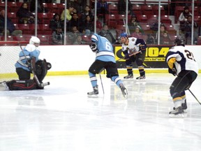 Sandy Bay Feathermen score on the OCN Penguins goal during the final game of the North American First Nations Hockey Tournament in Kenora in April 2012. The Penguins went on to win the game 5-3 and retained their championship title for the fifth consecutive year.
FILE PHOTO/Daily Miner and News