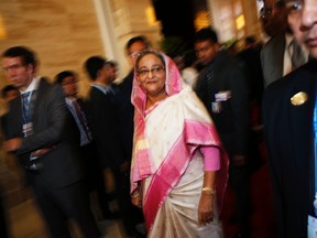 Bangladesh Prime Minister Sheikh Hasina leaves for a break during a plenary session on the second day of the Asia-Europe Meeting (ASEM) summit in Vientiane November 6, 2012.   REUTERS/Damir Sagolj