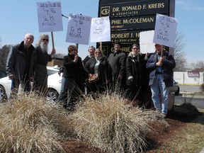 MICHAEL-ALLAN MARION, The Expositor

Members of the National Farmers Union, Organic Growers of Ontario and the Green Party stage an action rally in front of Brant MP Phil McColeman's constituency office  Tuesday to oppose the approval of genetically modified alfalfa.