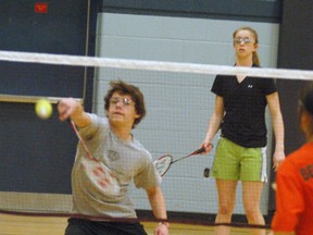 DARRYL G. SMART, The Expositor

Tyler Nagy from St. John's College lunges for the birdie as partner Kendra  VanLeeuwen looks on during the Brant County junior high school badminton championships Tuesday at Assumption College.