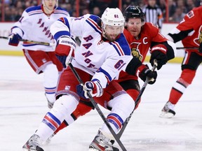 Power forward Rick Nash (front) of the New York Rangers scored two goals against the Maple Leafs on Monday night. Toronto heads to New York on Wednesday looking to sweep the back-to-back series. (Reuters/Files)