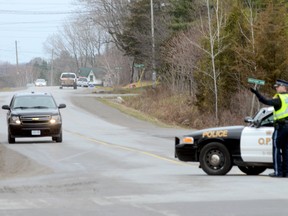 Quinte West OPP cruisers are seen here at the road blockade at Telephone Road and Second Dug Hill Road early Wednesday morning.
Police say the road closure was the result of an ongoing investigation but are releasing no further details.