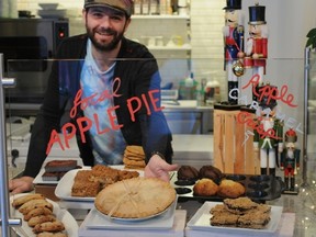 Serge Fiorino shows off tasty treats at Royal Majesty Espresso Bar Bakery, along the Apple Pie Trail in the Blue Mountains. (Handout)