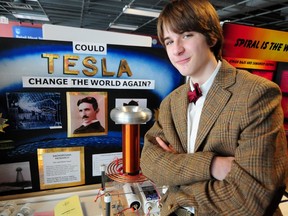 Grade 9 student Kieran Mastel poses beside his re-creation of a working Tesla coil during the Edmonton Regional Science Fair at NAIT’s main campus last weekend. TREVOR ROBB EDMONTON EXAMINER