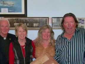 Malawi Water Project supporters, l-r, Neil Boyd, Canon Greene, Helen Timoffee, Lorna Greene, David Greene and Jerry Timoffee, The group was in Fairview to raise awareness of the problems faced in the African country of Malawi and the efforts being made to solve some of them through the Malawi Water Project which supplies water filters designed in Canada and built in Africa (concrete object sitting in front of the group). According to Helen Timoffee, contaminated water causes many deaths in Malawi and this simple filter can prevent many of those deaths, helping to boost rural economies.