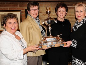 A Flight champions in the Thursday Morning Ladies Competitive League at the St. Thomas Curling Club this season are skip Barb Haskell, left, vice Brenda Cairns, second Justine Howes, lead Ardythe Anderson. R. MARK BUTTERWICK / St. Thomas Times-Journal / QMI AGENCY