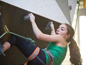 Bow Valley competitive climber Becca Frangos makes her way up one of the routes on Elevation Place’s climbing wall during the team’s first practice session in the new facility. Justin Parsons/ Banff Crag & Canyon