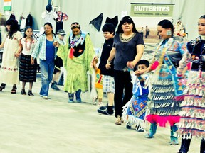 Members of the various groups involved take part in a Native American circle dance during the 3rd annual Sharing Our World event last year. The event is taking part once again this year on May 4 at Canad Inns where various cultures will be on display. (SUBMITTED PHOTO)