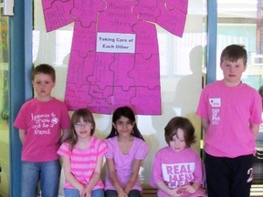 Matthew Belinski, Charlie Roy, Maryam Muhammad, Luca Scott and Ryland Semaniuk stand in front of a t-shirt created by each of the classes at Ecole Crescentview School in celebration of Red Cross Day of Pink, Wednesday. (ROBIN DUDGEON/THE GRAPHIC/QMI AGENCY)
