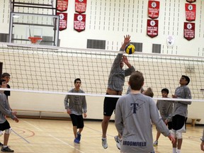 Members of the Fort McMurray Thunder U16 boys volleyball team scrimmage at the end of their practice on Sunday at Dr. Clark Public School gym. The Thunder, in their inaugural season, will be playing in their second tournament this weekend in Calgary.  TREVOR HOWLETT/TODAY STAFF