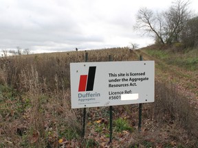 MICHAEL PEELING, QMI Agency
A sign marks the land where Dufferin Aggregates is expected to build a gravel pit along West River Road South near the intersection of Watts Pond Road in Paris.