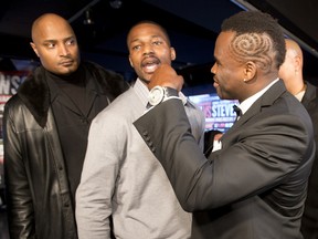Chad Dawson (left) and Adonis Stevenson (right) ham it up at a press conference in Montreal ahead of their June 8 fight at the Bell Centre. (Sebastien St-Jean/QMI Agency)