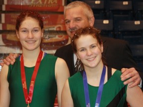 Kate Trotter (left) and Ella Boyle with one of their coaches Frankie Pozzebon.