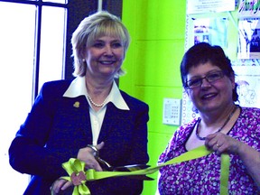 Mayor Gale Katchur helps to cut the ribbon during last weekend’s unveiling of the new Little Rascals Trading Post.

Photo Supplied