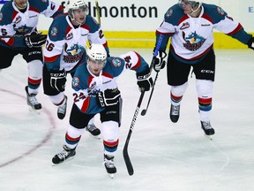 Former Fort Saskatchewan Bantam Ranger Tyson Baillie (front) helped his Kelowna Rockets make it past their first playoff bout against the Seattle Thunderbirds, scoring a hat-trick against the Seattle Thunderbirds, including an overtime game winner.

Photo by Ian Kucerak/QMI Agency