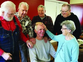 Bill Hartwick, a volunteer with South Frontenac Community Services Corporation (SFCSC), is thanked by (l-r) Colin Currie, George Fortier, Carl Collins, Frank Fibbs and Nellie Tyler for his volunteer work. Hartwick provides transportation for the Adult Day Service clients. SFCSC will be holding a volunteer appreciation night on Friday, April 13 at the Grace Centre in Sydenham to thank hundreds of volunteers.    Rob Mooy - Kingston This Week / Frontenac This Week