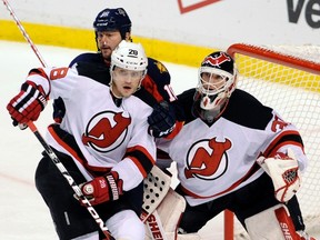 Devils defenceman Anton Volchenkov was suspended four games by the NHL for an elbow to the head of Bruins forward Brad Marchand. (RHONA WISE/Reuters)