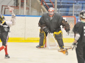 EDDIE CHAU Simcoe Reformer
Goaltender Josh Daley fends off attacks from his peers during the try out for the Norfolk Timberwolves bantam rep team Thursday at Talbot Gardens.