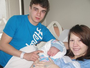 Newborn Grayson Lee Joseph is held by parents Alex Donnelly and Brennah Levac. Grayson was the first baby born in the Cornwall Community Hospital’s new wing on Thursday.
Staff photo/KATHRYN BURNHAM