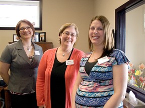 Dawn Froese, executive director of Big Brothers Big Sisters of Portage and District, centre, is pictured with case workers Maryanna Arendse, left, and Jocelyn Harder in their new offices. (CLARISE KLASSEN/PORTAGE DAILY GRAPHIC/QMI AGENCY)