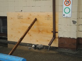 HEATHER IBBOTSON, The Expositor

A piece of plywood covers a section of wall at the Brant Artillery Gunners' Club on Henry Street. The wall was buckled in a mishap on Thursday afternoon when it was struck by a vehicle. No one was injured in the accident.