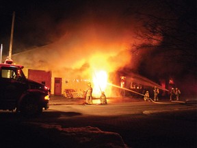 Firefighters with the Whitewater Region Fire Department battle the blaze that destroyed Gary and Rons Kitchens in Cobden late Thursday night. The Vlaming family, who own and operate the business, have said they are determined to rebuild. For more community photos please visit our website photo gallery at www.thedailyobserver.ca.