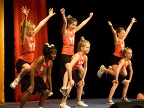 Members of the Cheer class perform during the Portage and District Arts Centre (PDAC) Dance Recital at the William Glesby Centre, Saturday afternoon. (ROBIN DUDGEON/THE GRAPHIC/QMI AGENCY)