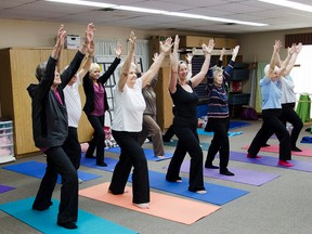 Ninety-one-year-old Myrtle Hodgins, fourth from the left in the front row (striped shirt), enjoys her weekly yoga session at the Tillsonburg Seniors Centre, Tuesday afternoon. Hodgins has practised yoga for around 30 years and finds many benefits, physical and mental including increased sleep, flexibility and relaxation. Beathanie Wood/Tillsonburg News Student Placement