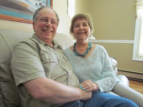 Nancy and Lou Salvalaggio, seated in their Sault Ste. Marie home, called Sunday their first "official" day of retirement.