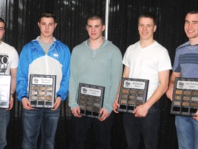 The Grande Prairie JDA Kings put a cap on their 2012-2013 North West Junior Hockey League championship season with the team awards on Saturday night. Pictured from left are: Unsung Hero, Jared Burnett; Most Valuable Defenceman, Dustin Gould; Most Valuable Rookie Sheldon Hubbard; Most Valuable Player, Nolan Trudeau and Most Dedicated Player, Devin Bell. Playoff MVP Adam Hodge and Rookie co-winner Joel Wamsteeker are absent. (TERRY FARRELL/DAILY HERALD-TRIBUNE)